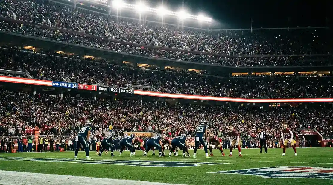 Análisis de líneas de spread en partidos NFL con gráficos de estadísticas y tablero de apuestas